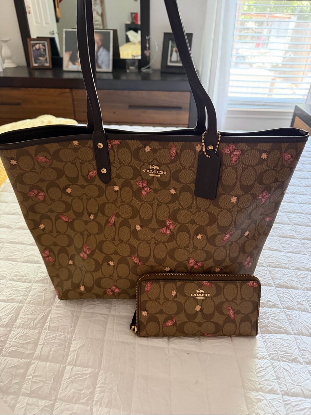 Coach Brown Signature Canvas Tote with Pink Butterfly Motif